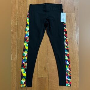 LuLaRoe Jordan womens athletic black leggings triangles size L moisture wicking.